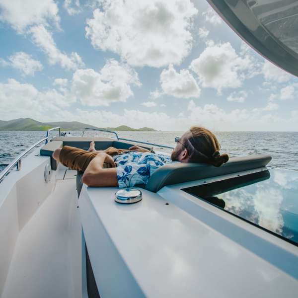 a boat that is sitting on the side of a pool of water