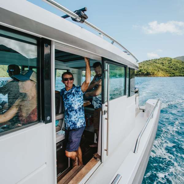 a person riding on the back of a boat