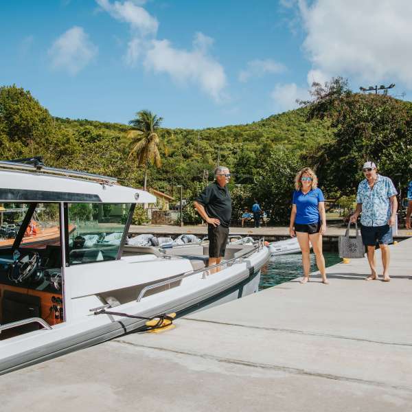 a group of people at a bus stop