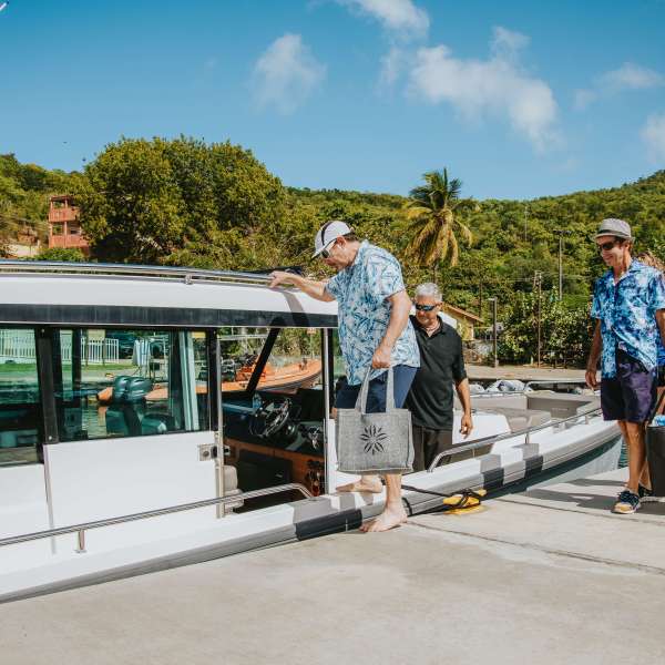 a group of people riding skis on top of a ramp